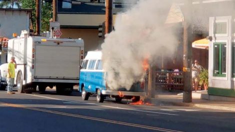 Vintage VW rental van catches fire